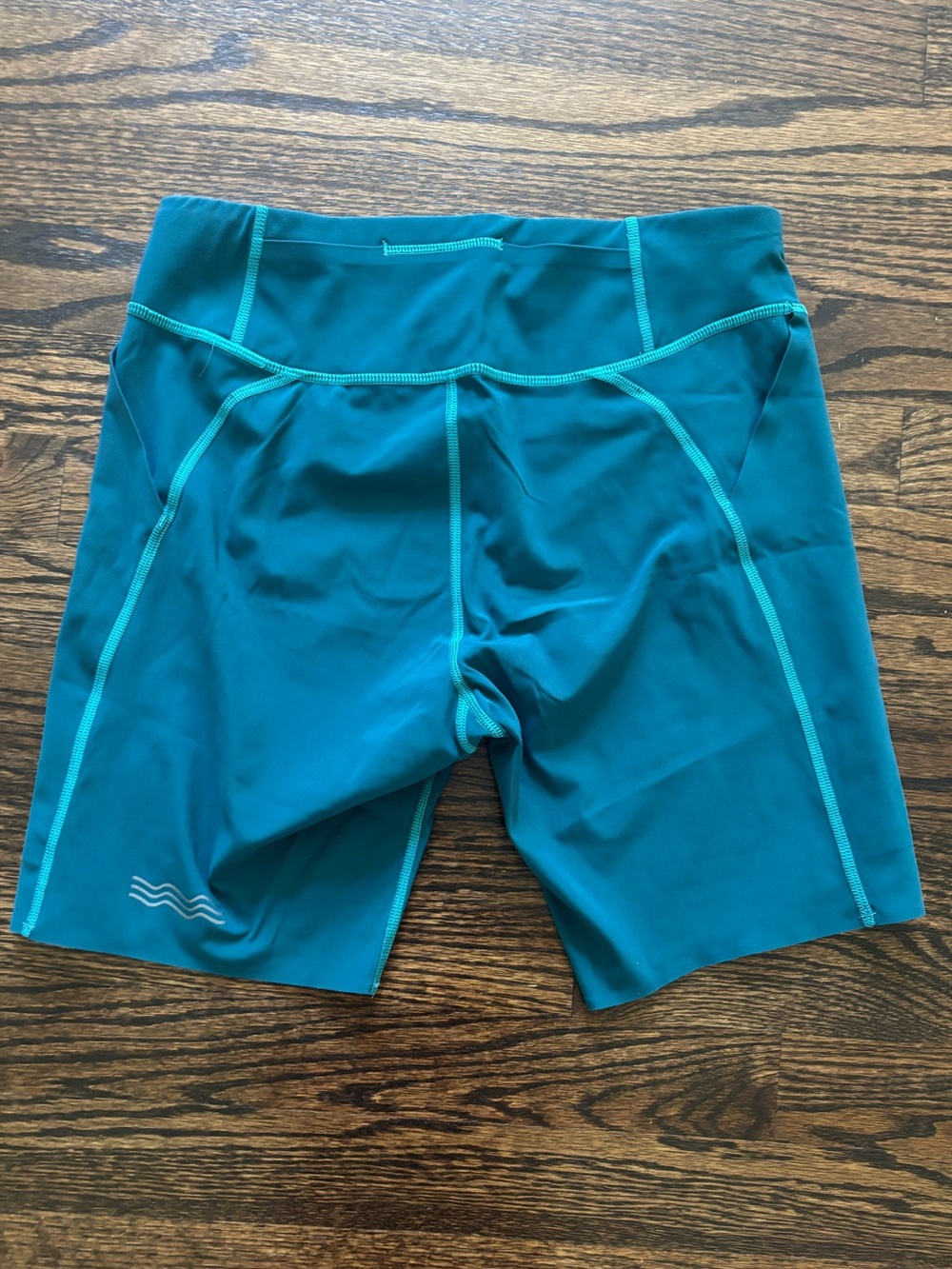 Janji women’s trail running groundwork pace shorts 7” inseam medium teal